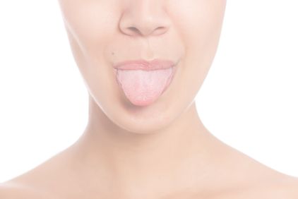 Photo of a woman sticking out her tongue.
